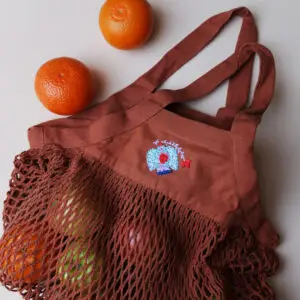 H&auml;keltasche mit handgesticktem Vogel