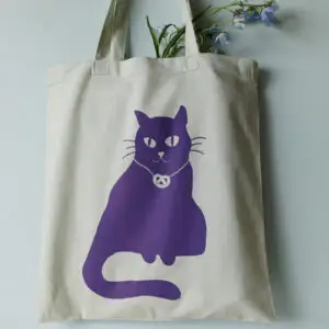 handbedruckte Stofftasche mit Katzenmotiv und Breze lindgrün